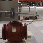 Ball valve with spring return pneumatic actuator and panel with Versa pilot valve