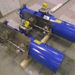 Spring return hydraulic actuators with vol boosters and panels