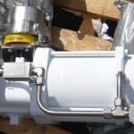 Air recirculation system on spring return actuator